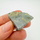 Detail shot of Grade AA Labradorite raw under natural light