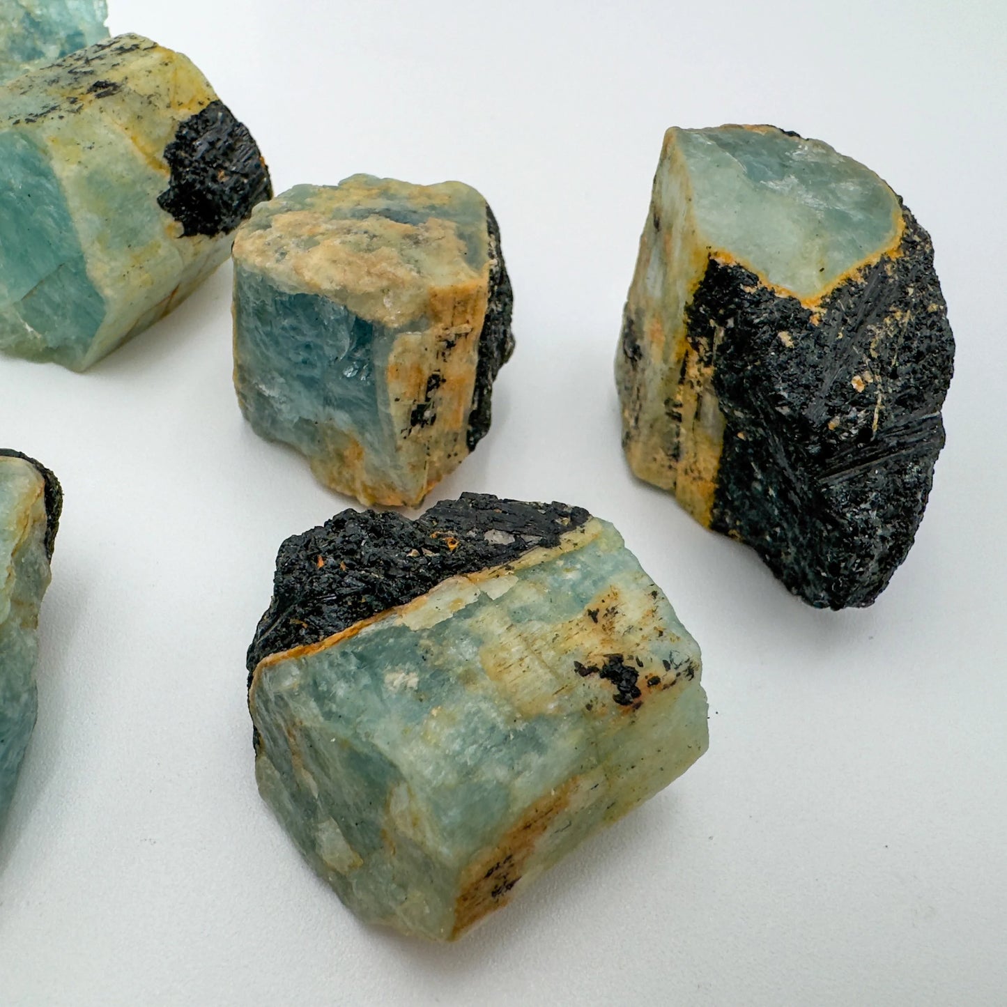 Lifestyle view of a Black Tourmaline raw stone, from Namibia.