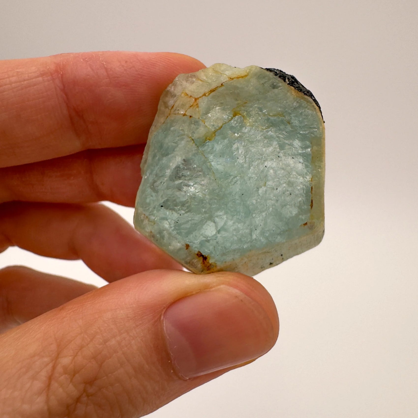 Close-up of Black Tourmaline raw crystal from Namibia, soothing wellness stone for Stress Relief