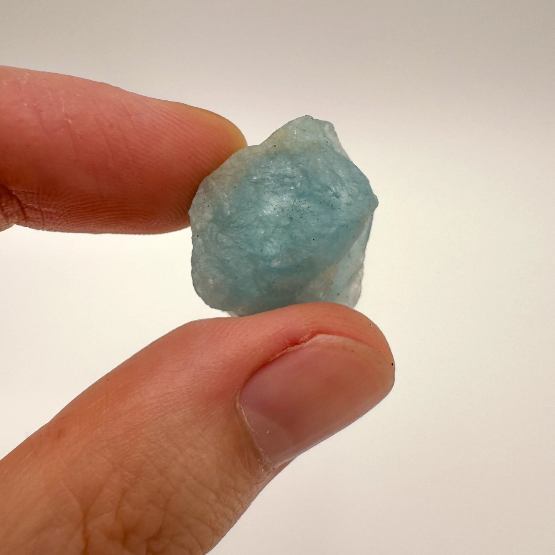 Back view of Grade A Black Tourmaline raw showing natural surface