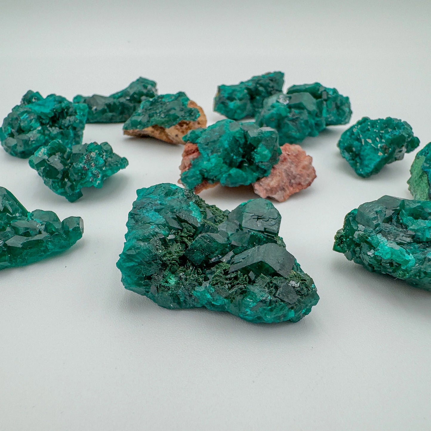 Color detail of green Dioptase raw stone, showing untreated character.