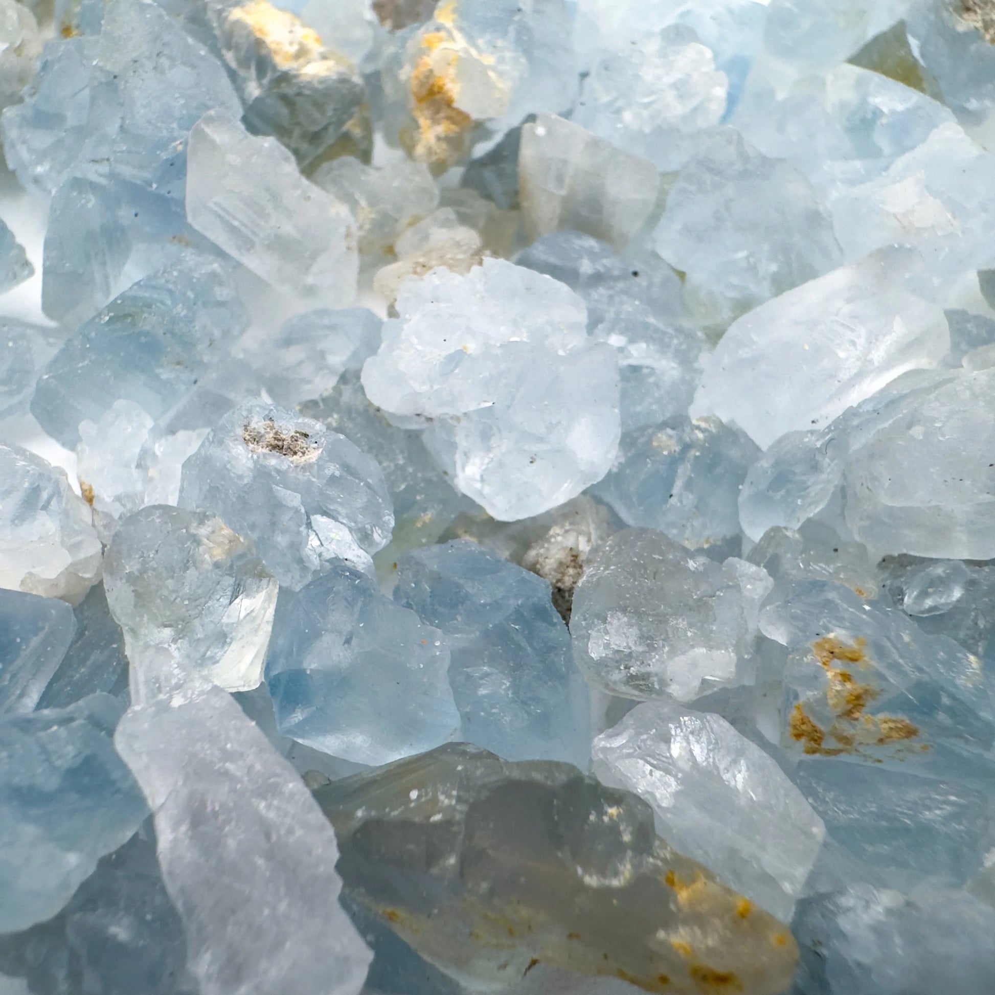 Hand-scale shot of a Celestite raw stone, hand-selected from Sakoany, Madagascar.