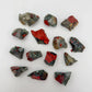 Edge-on view of Bloodstone raw stone, showing open form, sourced from Hhohho, Eswatini.