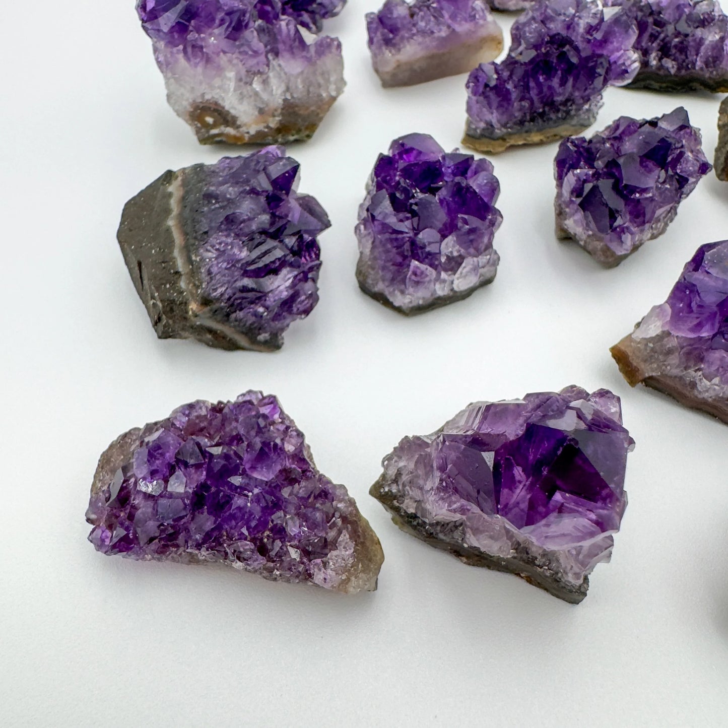 Top-side view of Grade AA Amethyst specimen, showing open form, often kept for Stress Relief.
