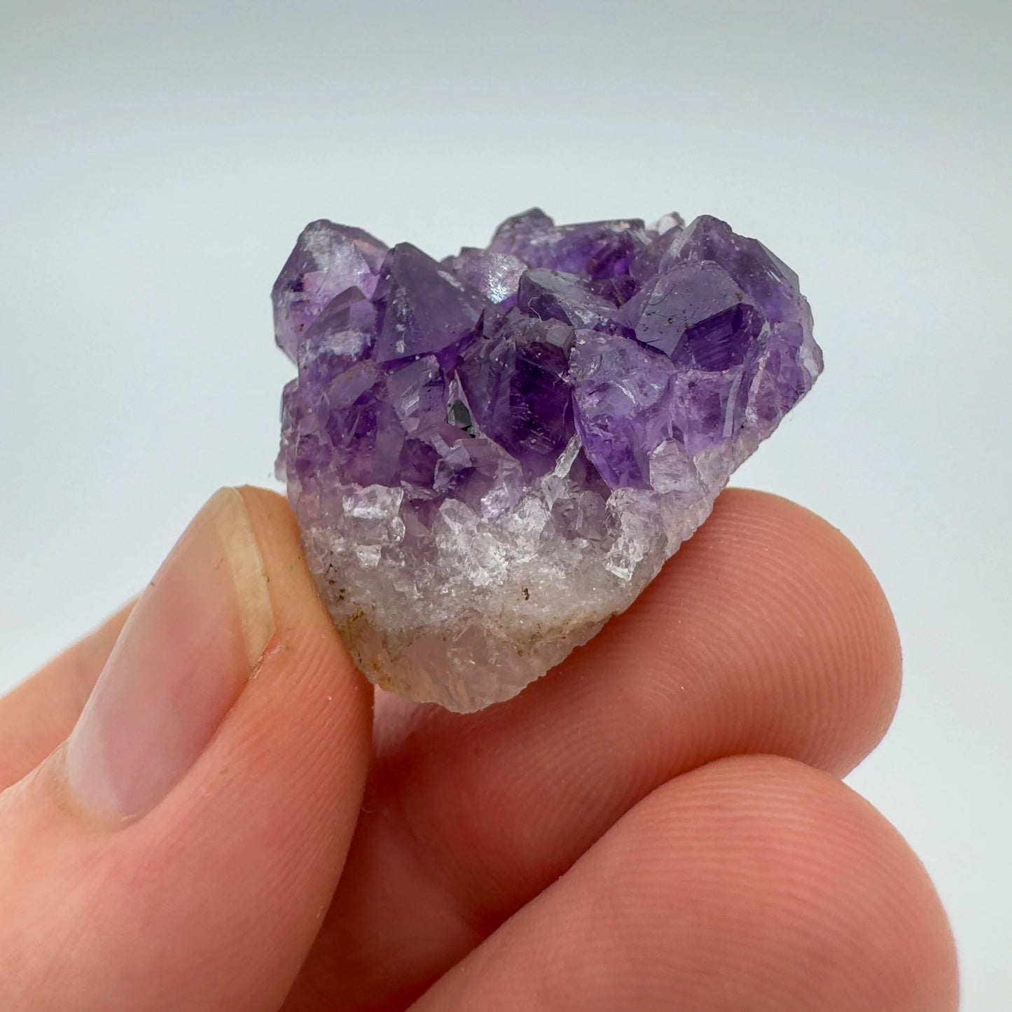 Back view of Grade AA Amethyst cluster showing natural surface