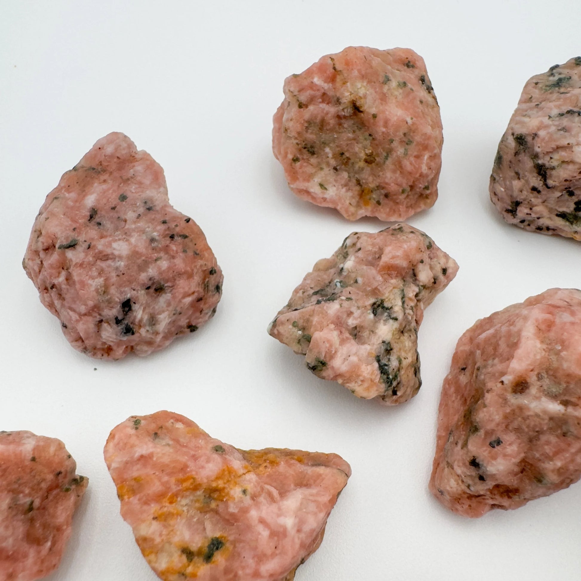 Lifestyle view of a Orange Calcite raw stone often paired with practices around Energy and Creativity, sourced from Betsiboka.