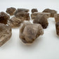 Macro view of Smoky Quartz raw stone, associated with Grounding and Protection, from Rio Grande do Sul, Brazil.
