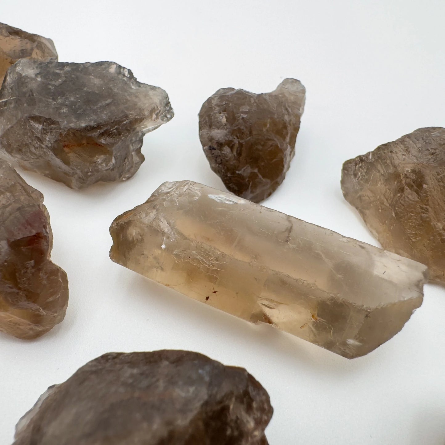 Reverse side of Smoky Quartz raw stone, often kept for Grounding, Brazil-sourced.