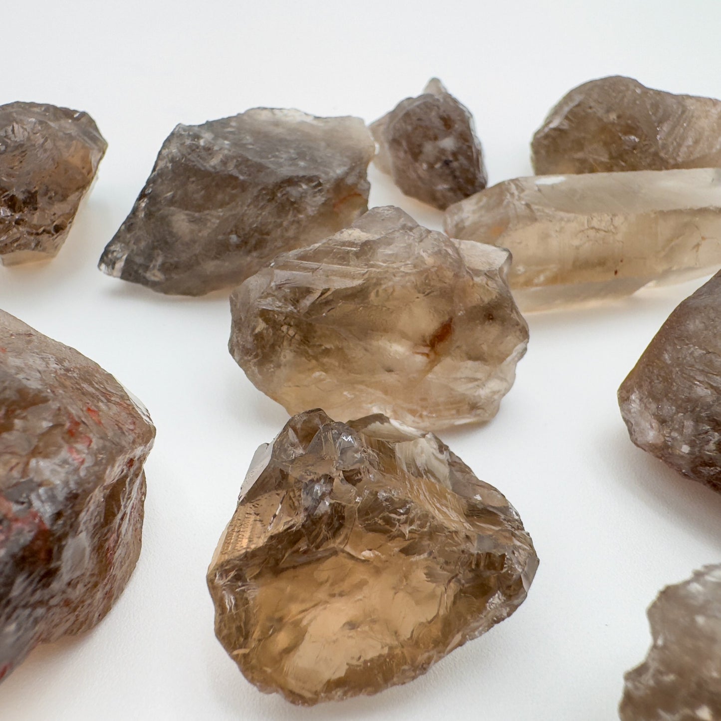 Lifestyle view of a Smoky Quartz raw stone, Brazil-sourced.