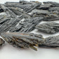 Side-on view of Black Kyanite raw stone, showing natural sheen, from Minas Gerais, Brazil.