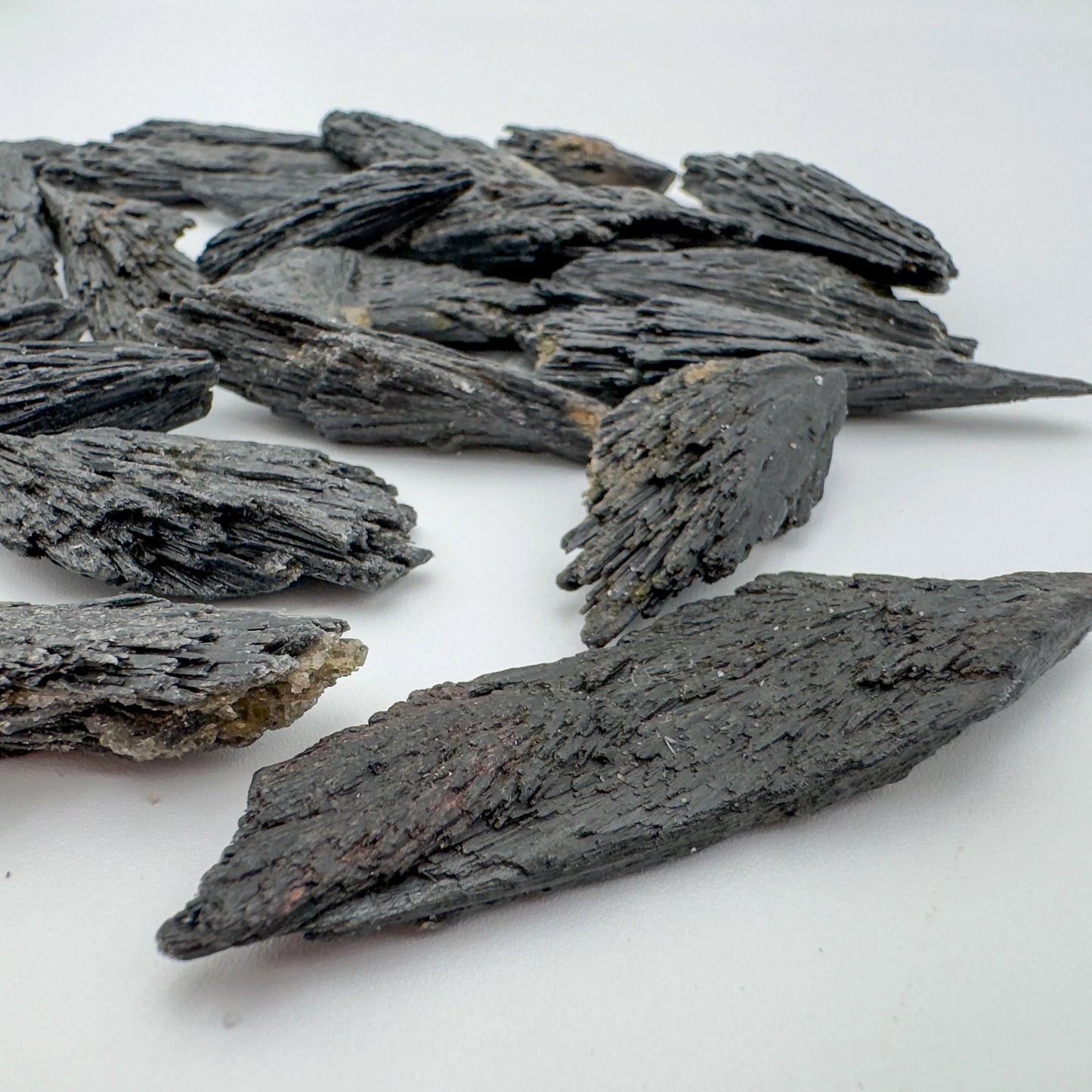 Plan view of Grade A Black Kyanite raw stone, hand-selected from Minas Gerais, Brazil, for Protection.