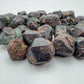 Near view of Fuchsite raw stone, showing earthy tone.