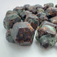 Sideways view of Fuchsite raw stone, turned to for Healing.
