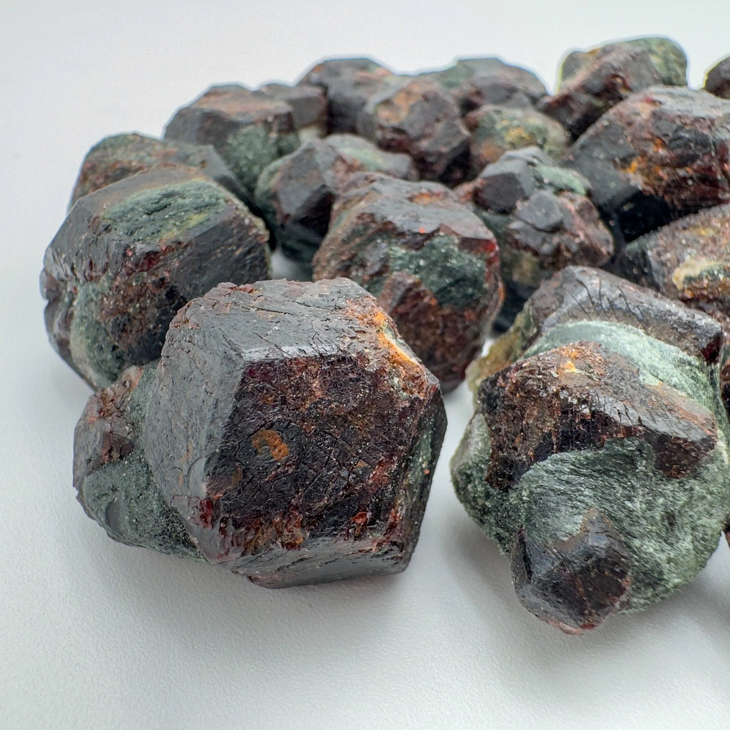 Sideways view of Fuchsite raw stone, turned to for Healing.