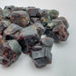 Bird's-eye view of Grade AA Fuchsite raw stone, kept near for Healing and Self Love, sourced from Zimbabwe.