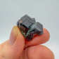 Back view of Grade AA Fuchsite raw showing natural surface