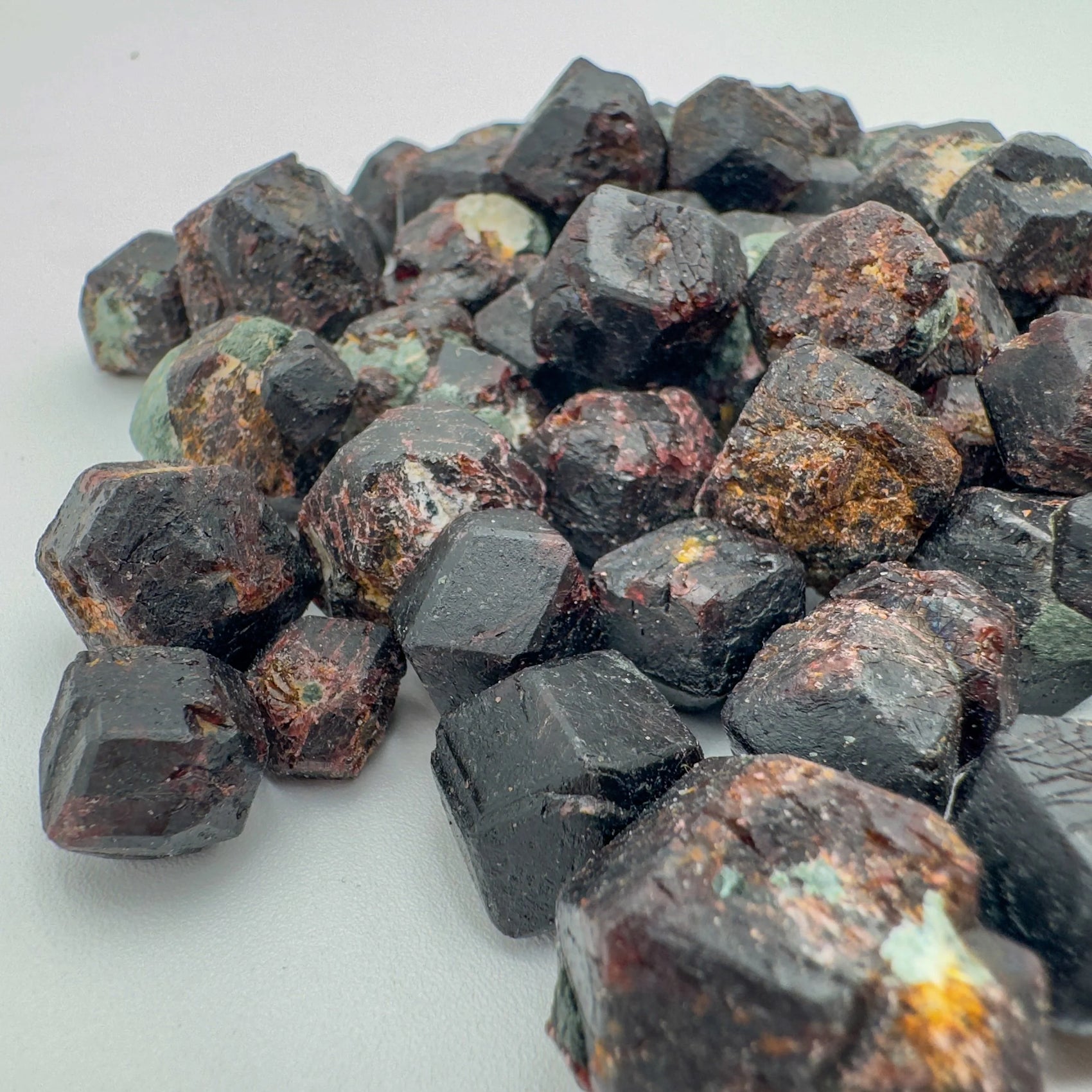 Side angle of Fuchsite raw stone, showing characteristic patterning.