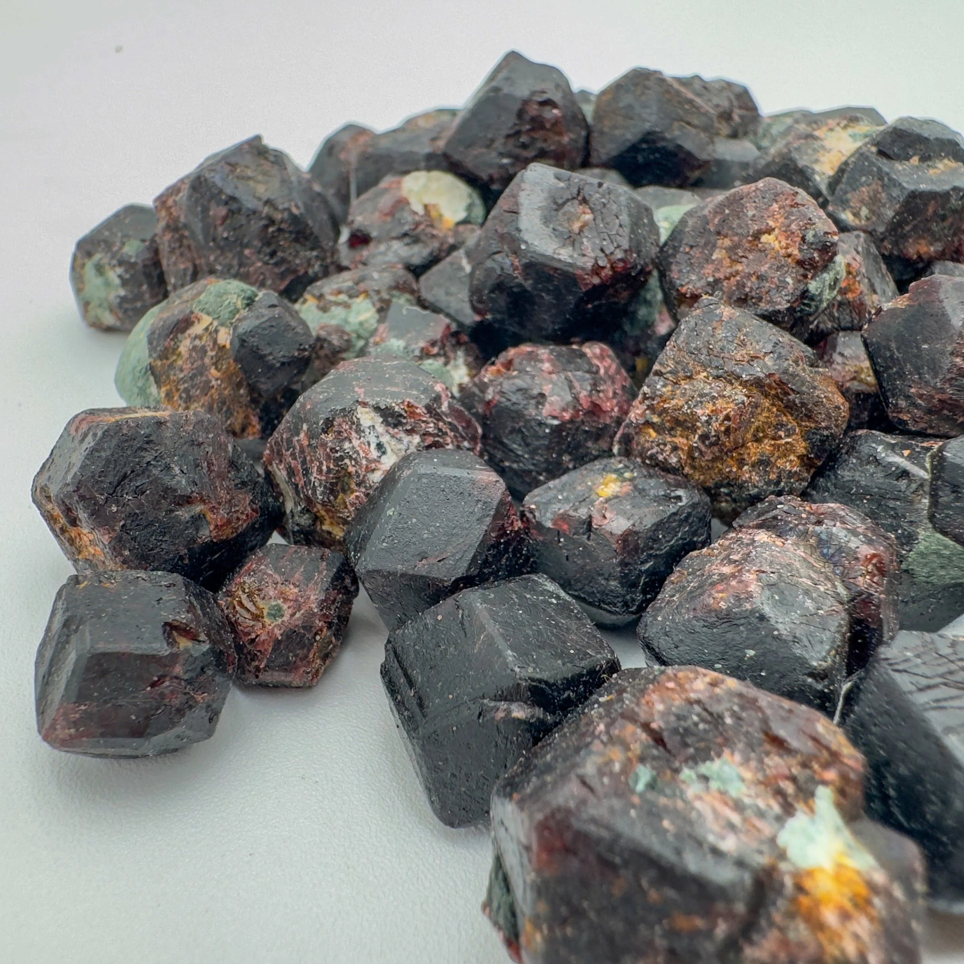 Side angle of Fuchsite raw stone, showing characteristic patterning.