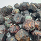 Underside detail of Fuchsite raw stone, from Zimbabwe, showing subtle veining.