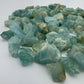 Bird's-eye view of Aquamarine raw stone, showing characteristic finish.