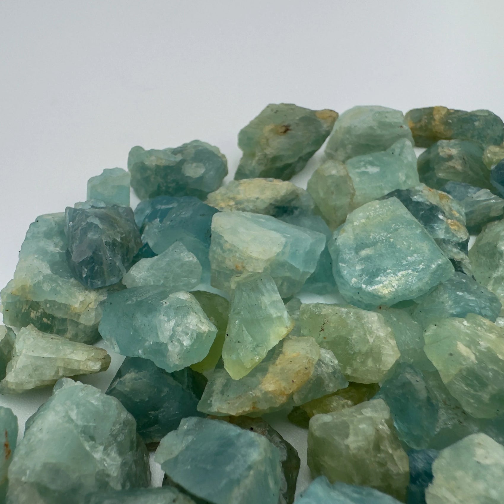 Natural light view of one Aquamarine raw stone for scale, from Huíla Province, Angola.