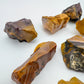 Underside detail of Mookaite raw stone, sourced from Western Australia, Australia, showing characteristic patterning.