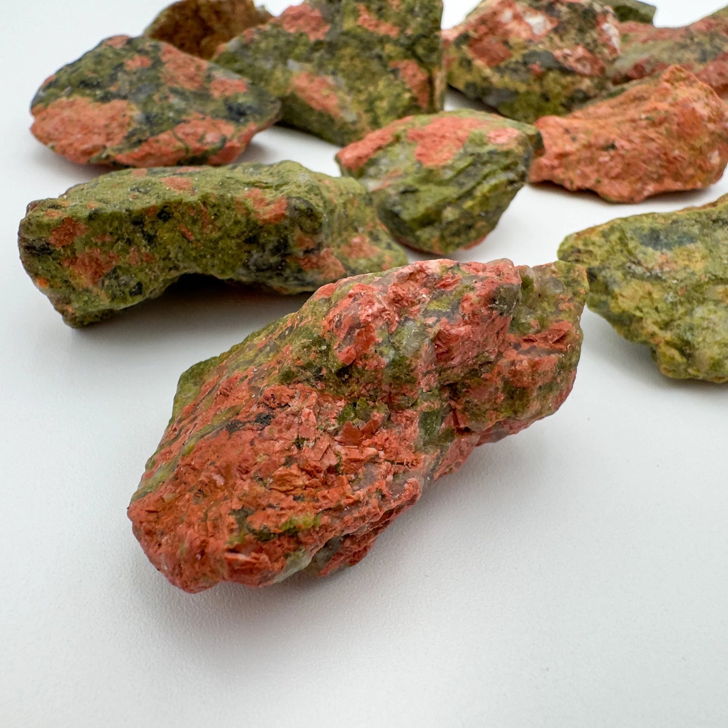 Detail of Unakite raw stone, showing characteristic finish.