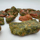 Profile view of Grade AA Unakite raw stone, for Emotional Healing.