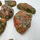 Top view of Grade AA Unakite raw stone, South Africa-sourced.