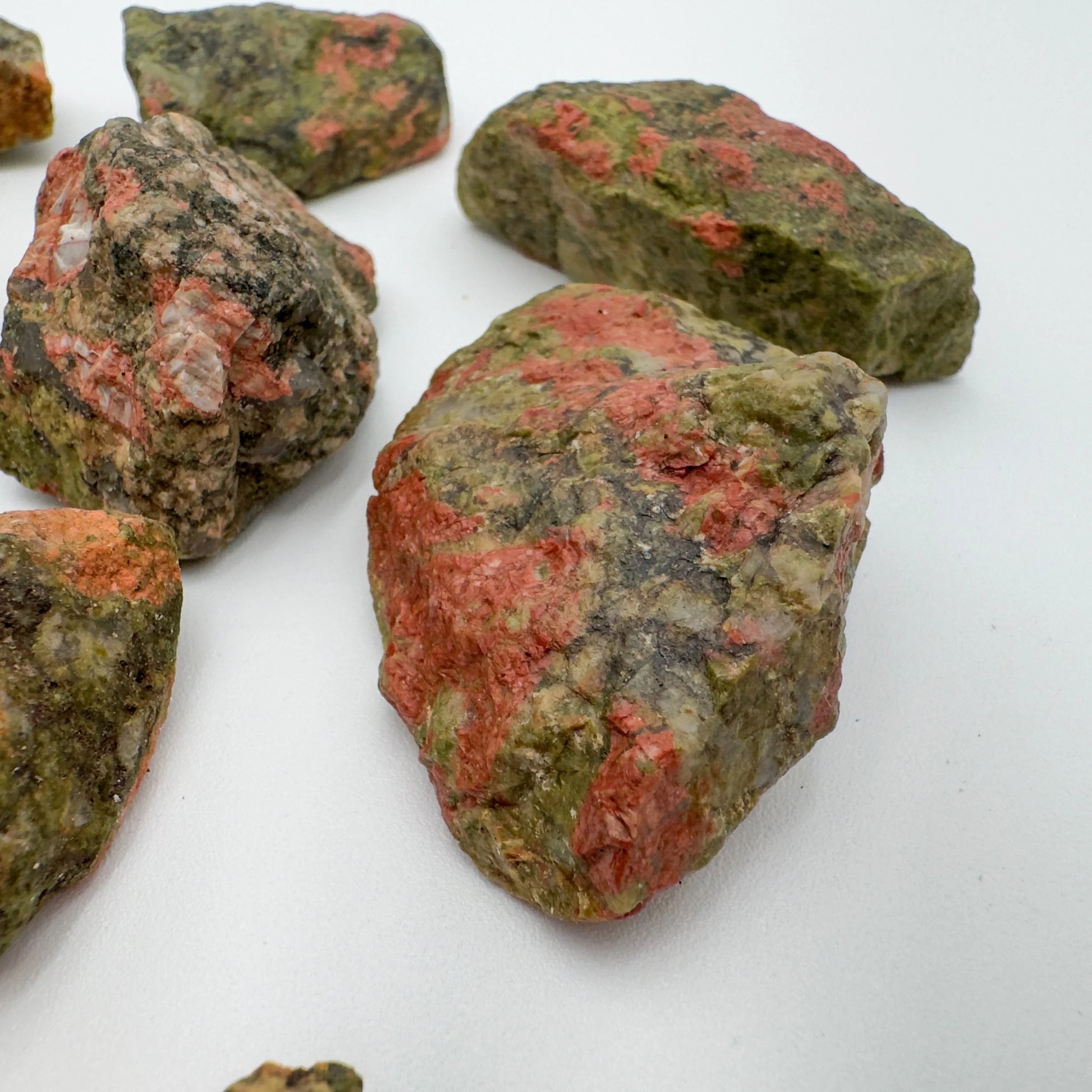 Top view of Grade AA Unakite raw stone, South Africa-sourced.