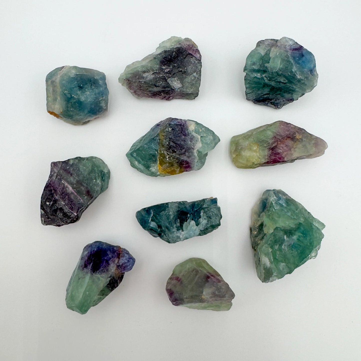 Close-up of Grade AA Fluorite raw stone, showing natural variation.
