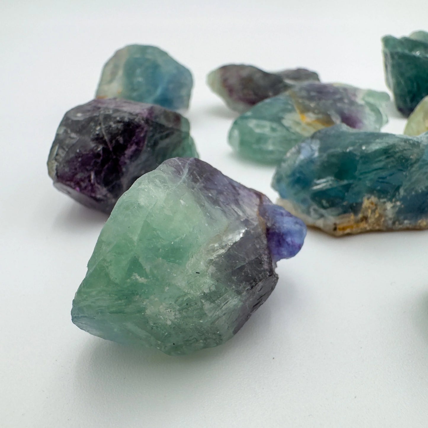 Edge-on view of purple Fluorite raw stone, showing characteristic patterning, sourced from Erongo, Namibia.