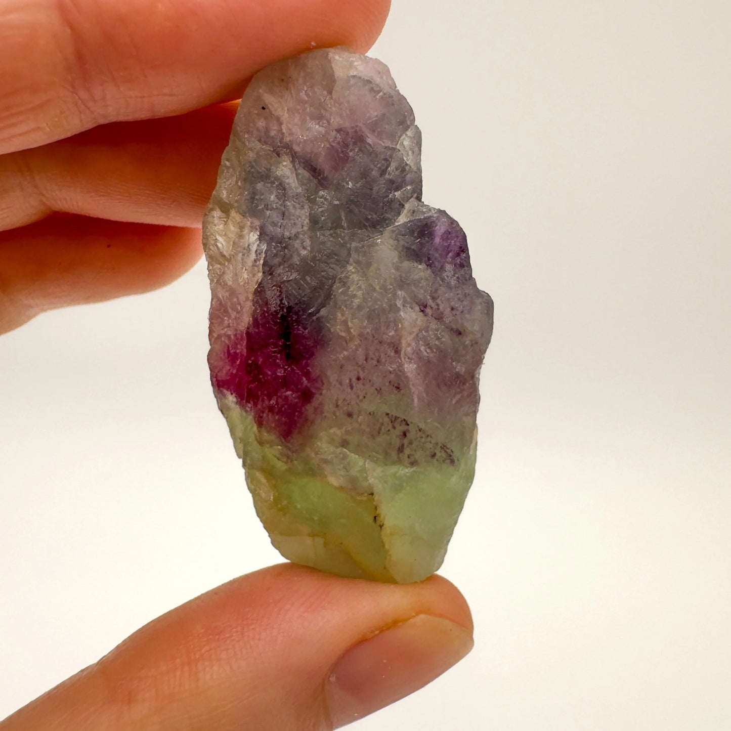 Wider context of Fluorite raw crystal, from Erongo, Namibia, set to give a sense of weight.