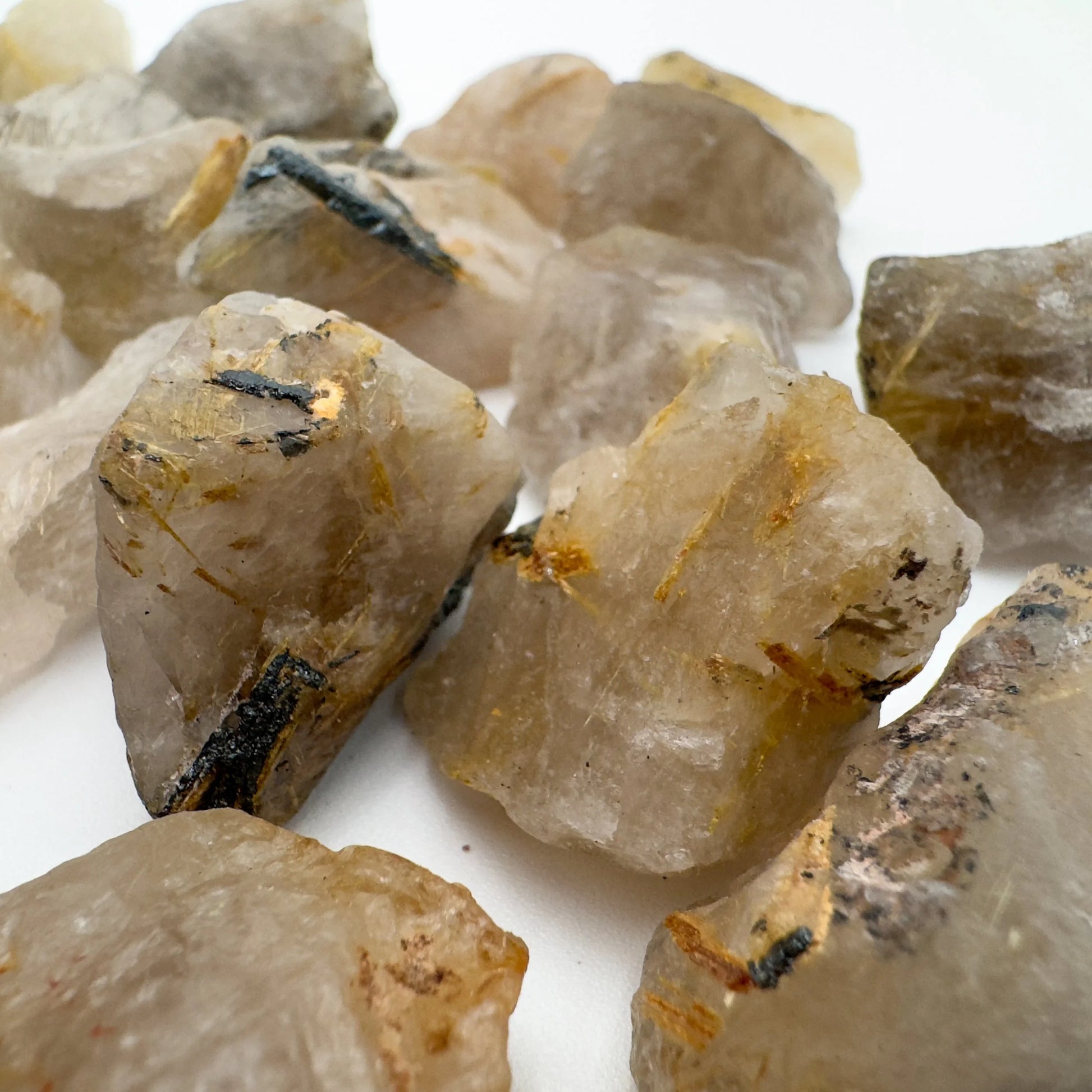 Profile view of Quartz raw stone, worked with for Cleansing, showing subtle veining.