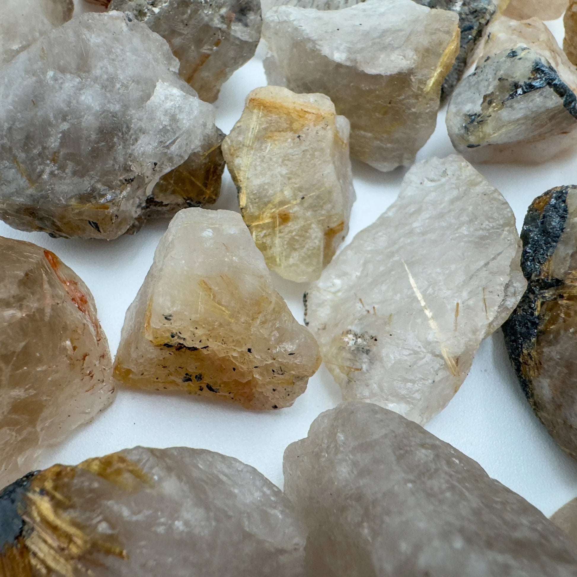 Hand-held view of a Quartz raw stone worked with for Cleansing.