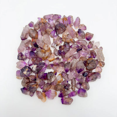Ethically sourced Grade A Smoky Amethyst point from Masvingo, Zimbabwe at Beyond Bohemian
