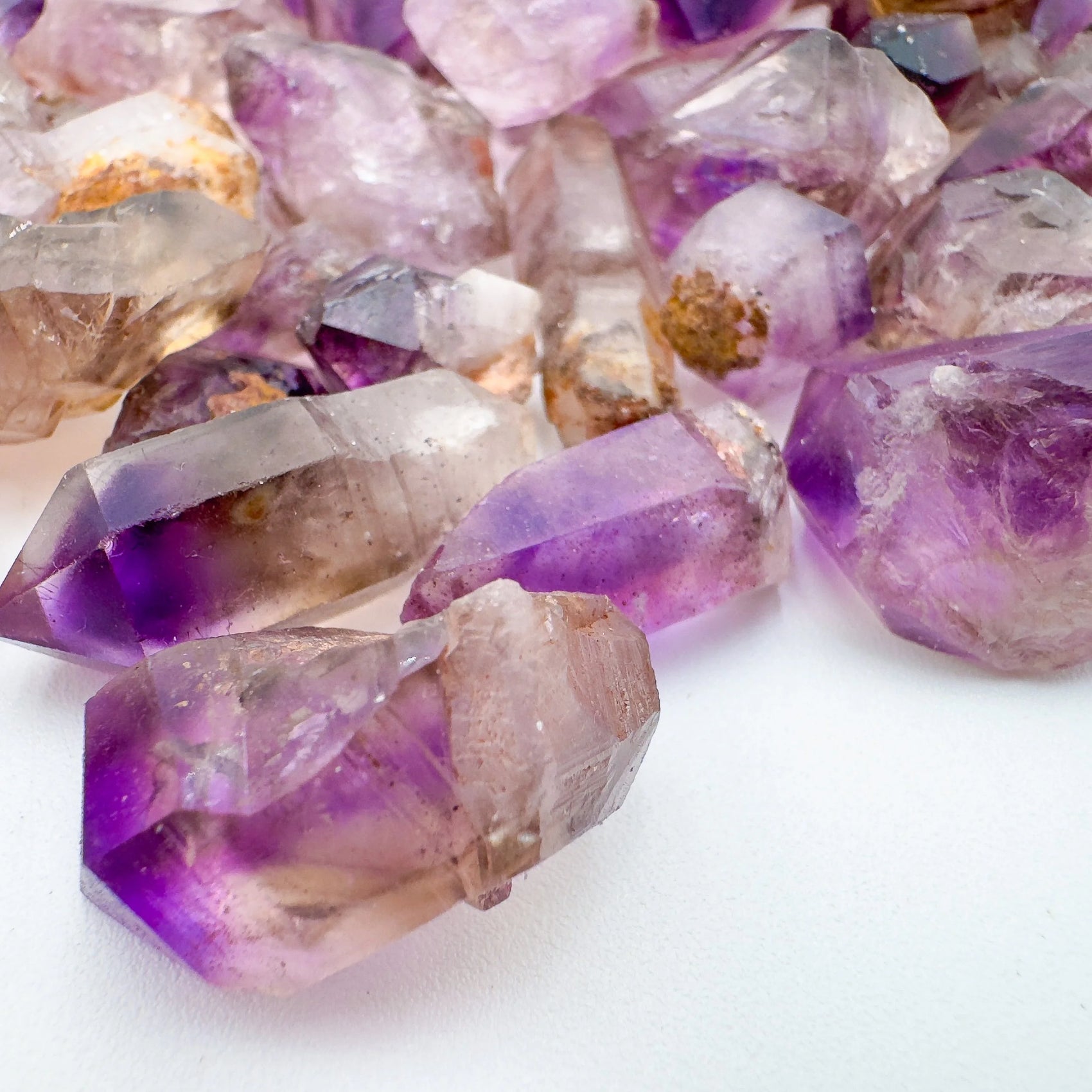 Close-up of Smoky Amethyst raw crystal from Zimbabwe, soothing wellness stone for Meditation