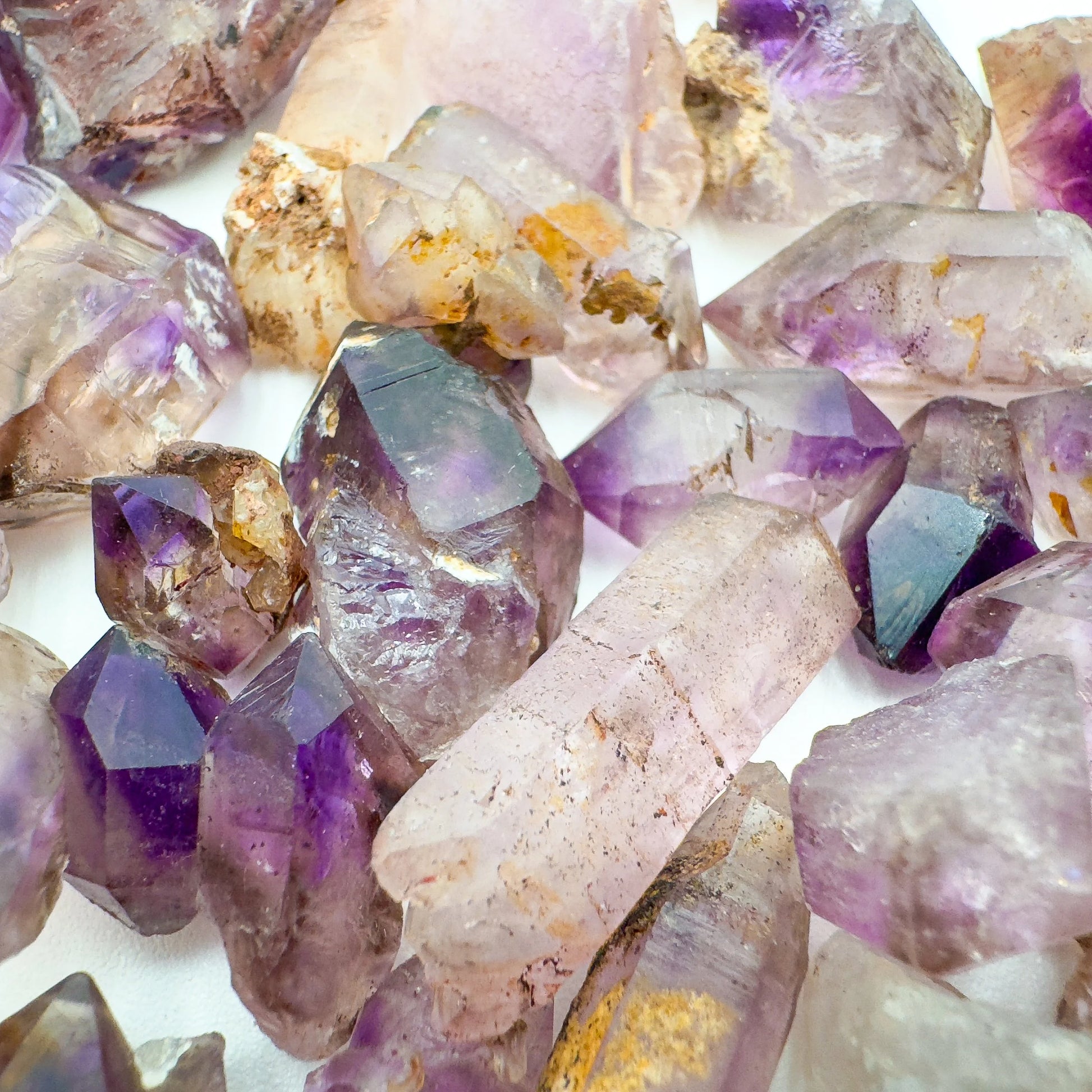 Underside detail of Smoky Amethyst raw point, hand-selected from Masvingo, Zimbabwe.