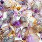 Profile view of Smoky Amethyst raw point, often worked with for Grounding, showing open form.