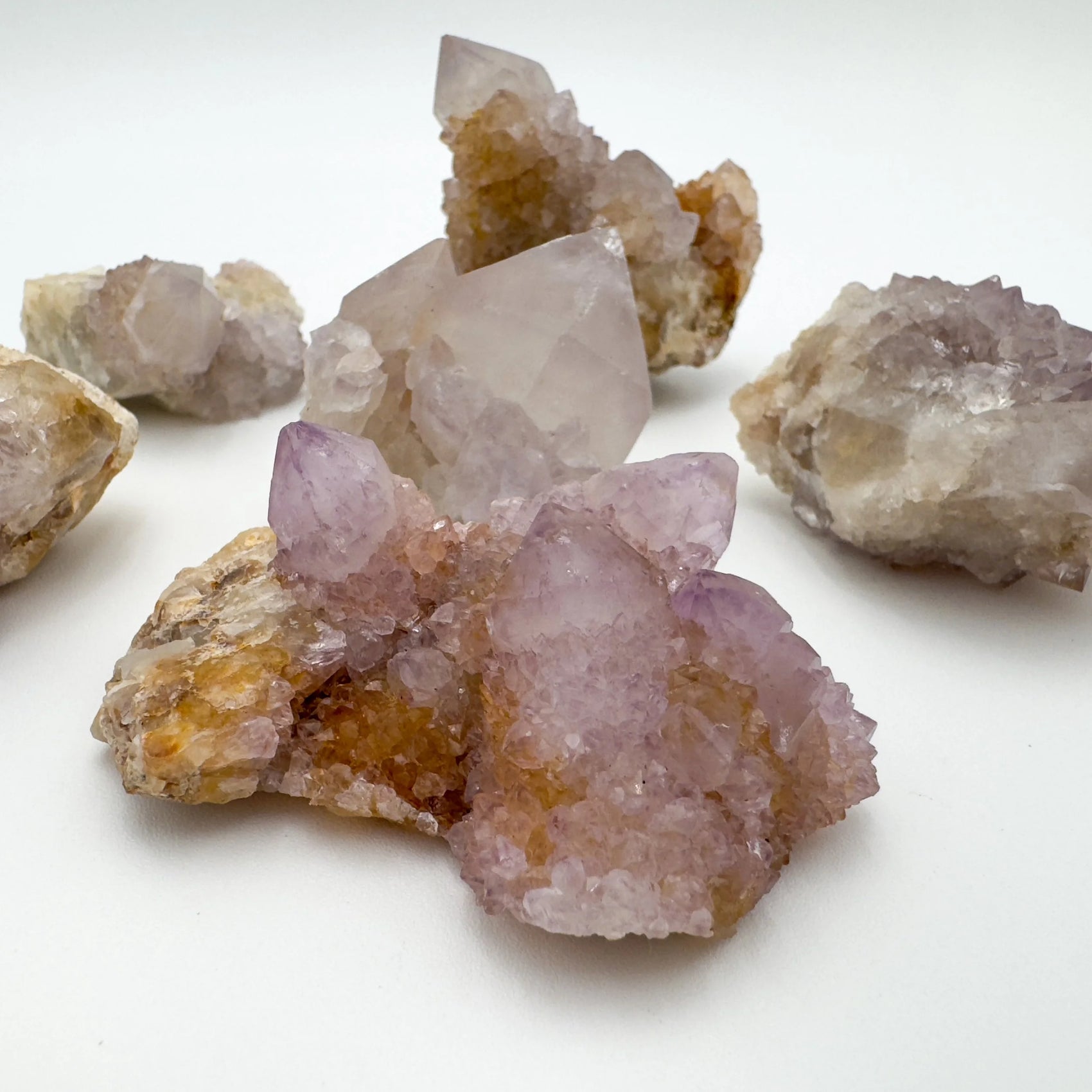 Side profile of Quartz raw stone, showing natural texture.