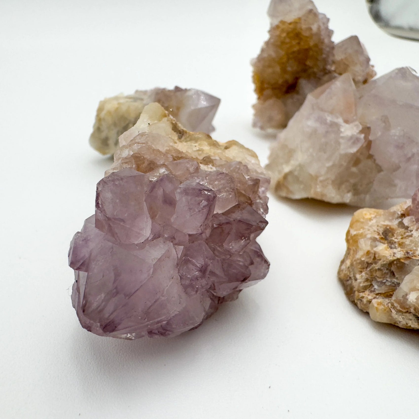 Alternate angle of Grade AA Quartz raw stone, sourced from Mpumalanga, South Africa, showing natural inclusions.