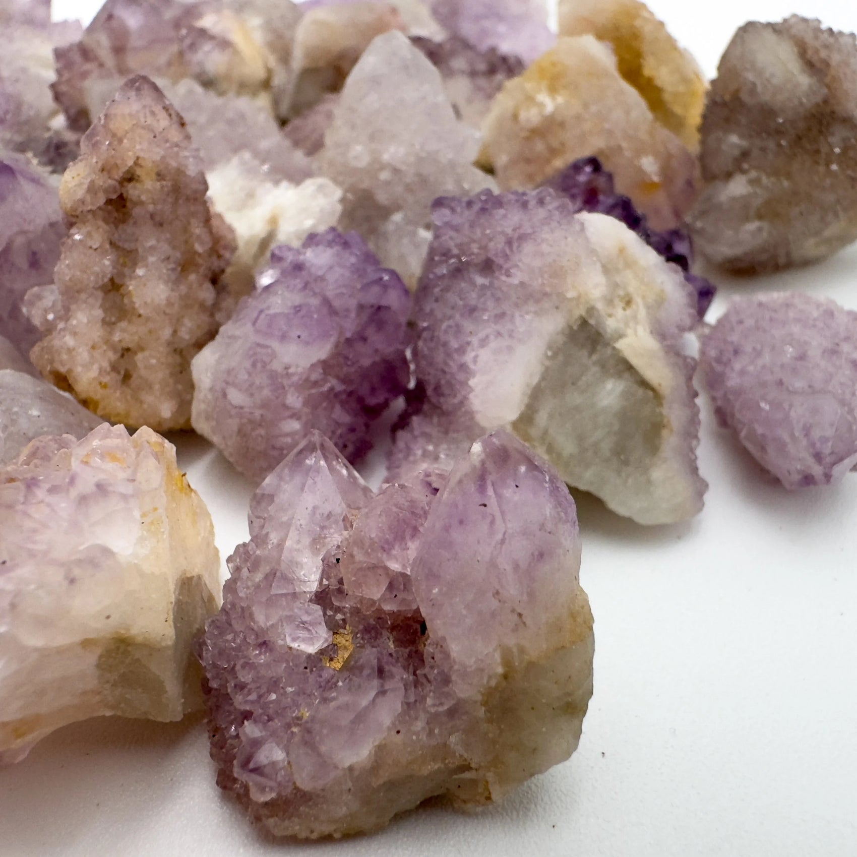 Underside view of Quartz raw stone, showing natural texture.