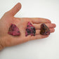 Full profile of Grade AA Rhodonite raw ready to ship from Beyond Bohemian