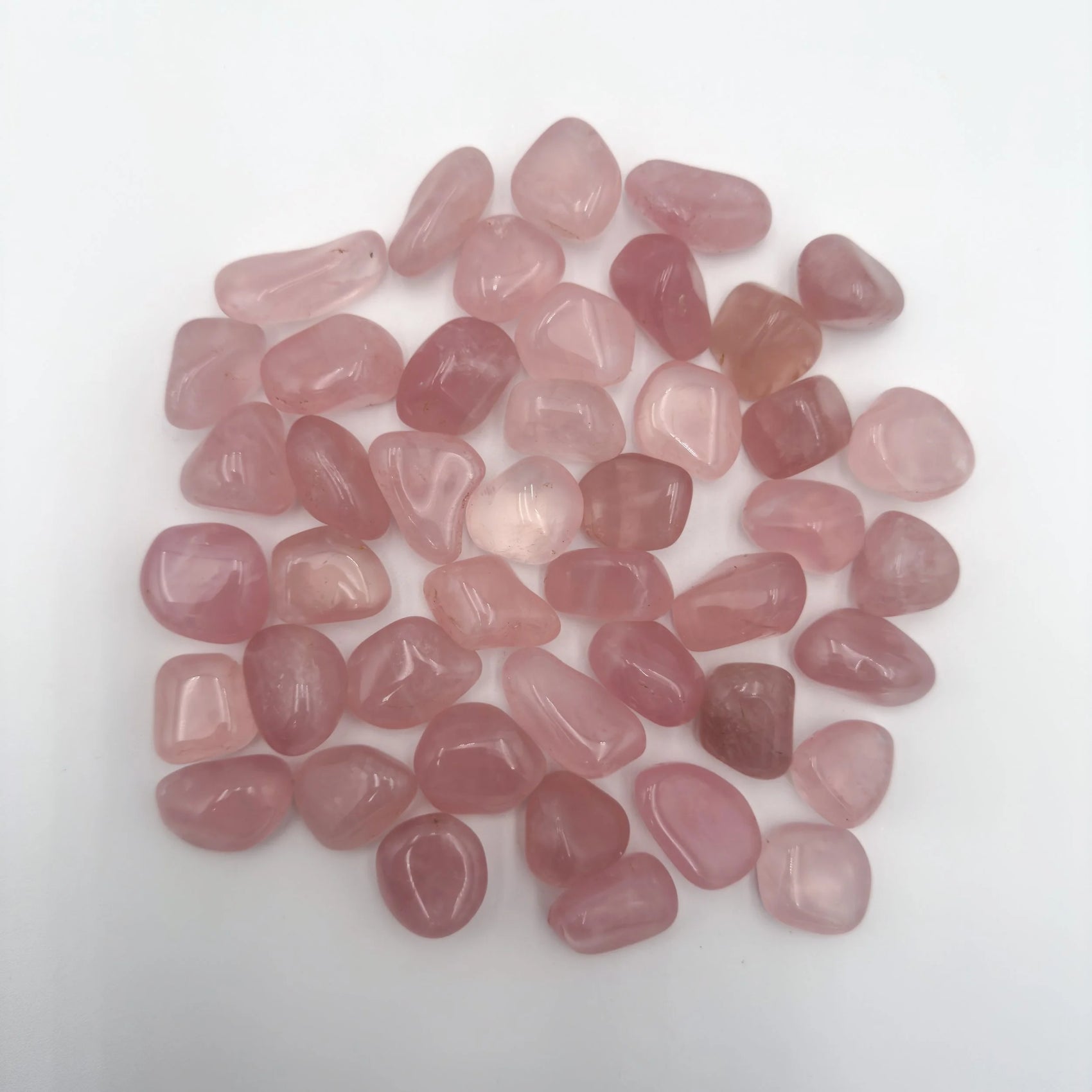 Close-up of Rose Quartz tumbled stone from Brazil, soothing wellness stone for Emotional Healing