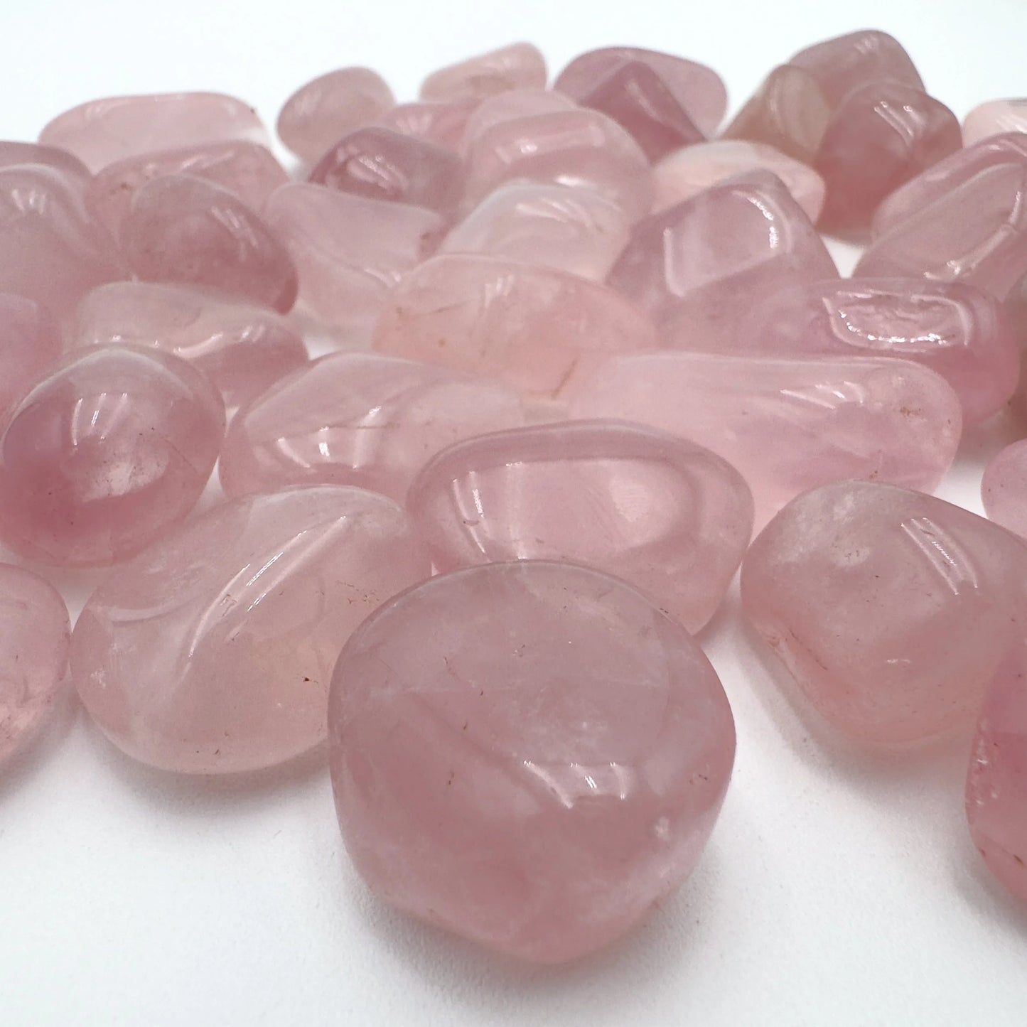 Close-up of Rose Quartz tumbled stone from Brazil, soothing wellness stone for Emotional Healing