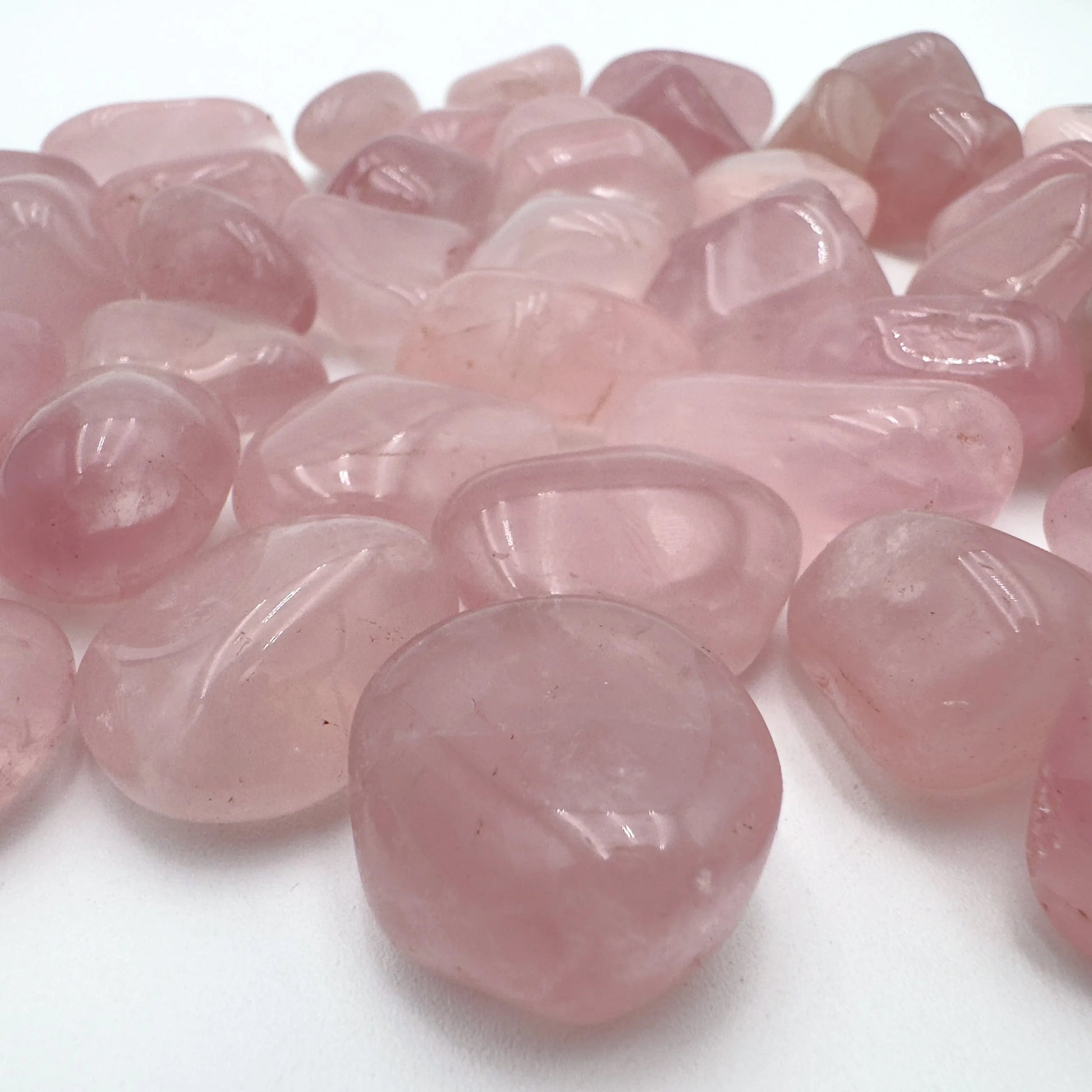 Close-up of Rose Quartz tumbled stone from Brazil, soothing wellness stone for Emotional Healing