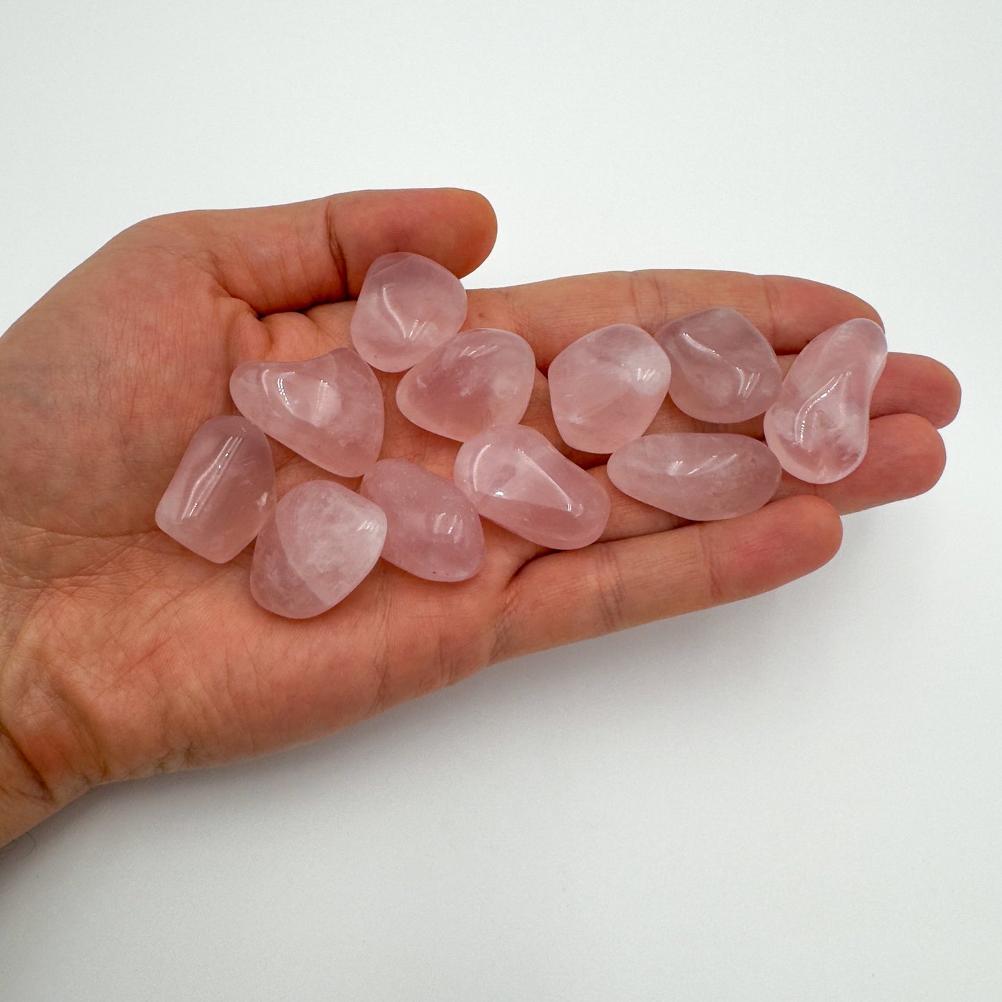 Rose Quartz tumbled stone from Brazil with Pink color, polished finish for mindful calm