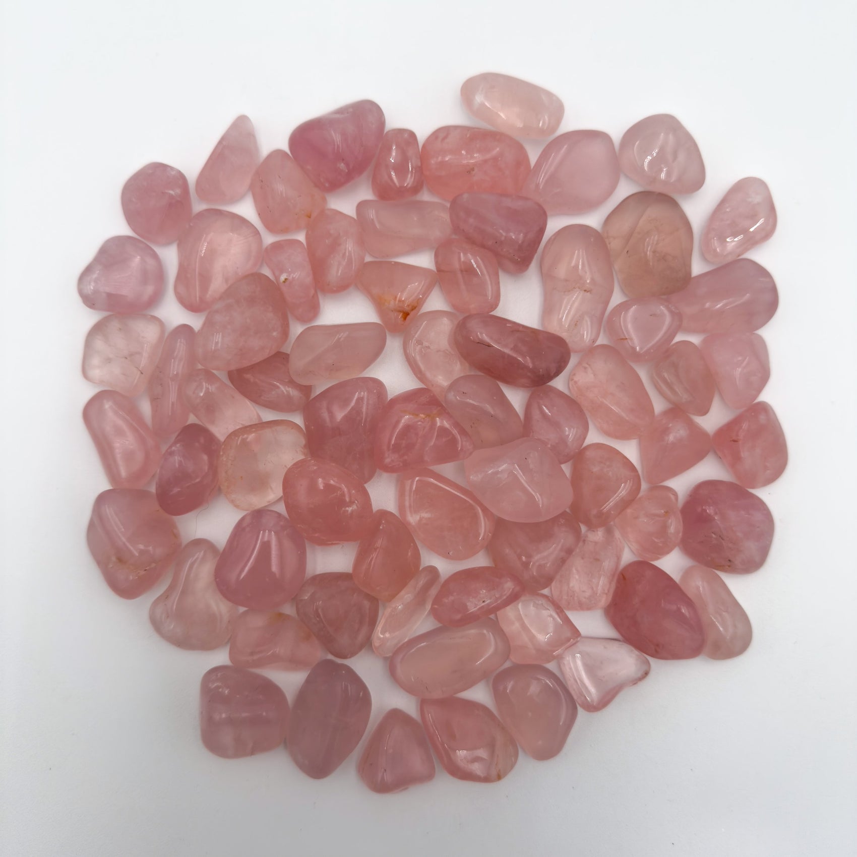 Close-up of Rose Quartz tumbled stone from Brazil, soothing wellness stone for Emotional Healing
