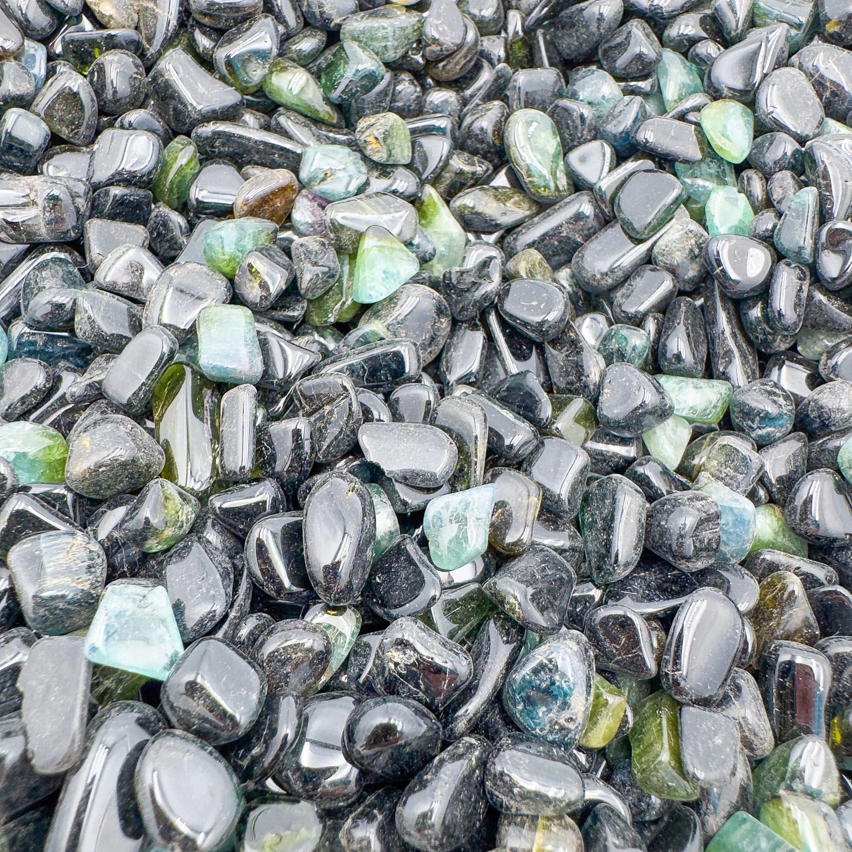 Handheld Green Tourmaline crystal from Mozambique for meditation, Abundance and Emotional Healing