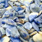 Detail of Sodalite polished chip, from Namibia, carried for Focus.
